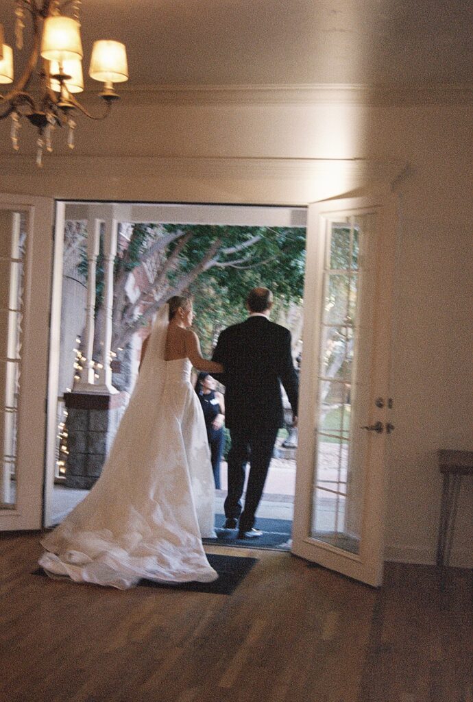 bride and brides dad walking to ceremony