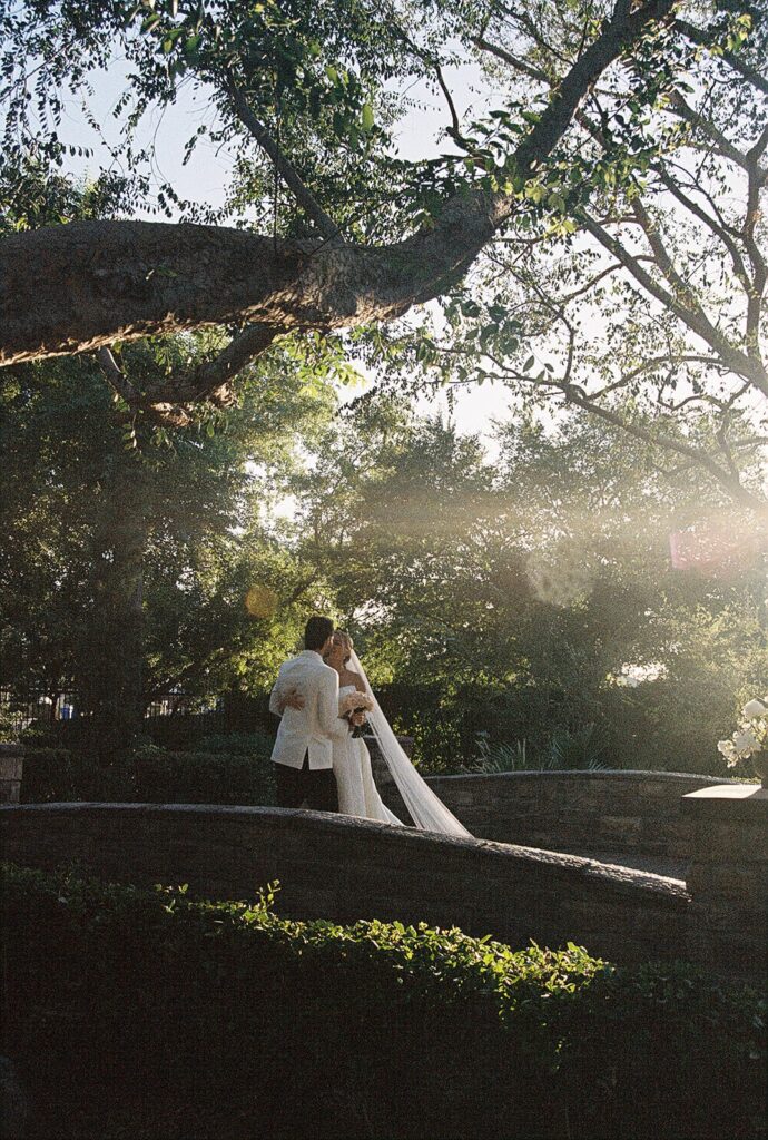 bride and groom posing during wedding portraits