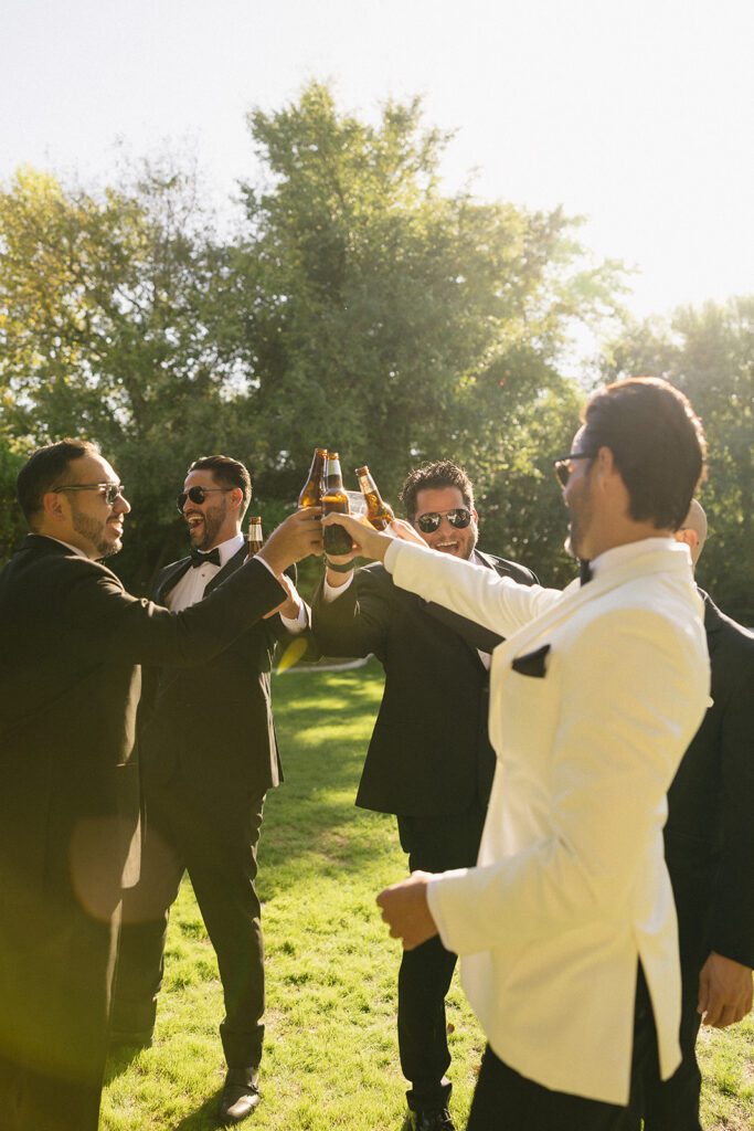 groom with his groomsmen during getting ready photos