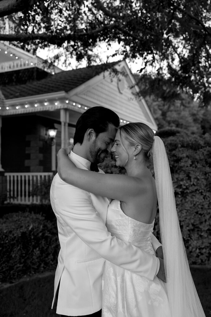 bride and groom standing with each other during portraits