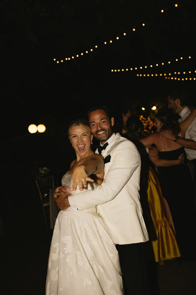 A luxe timeless wedding day in Scottsdale Arizona with bride and groom holding each other on the dance floor