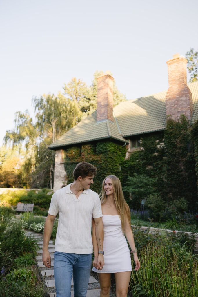 couple walking in garden  at denver botanical gardens 