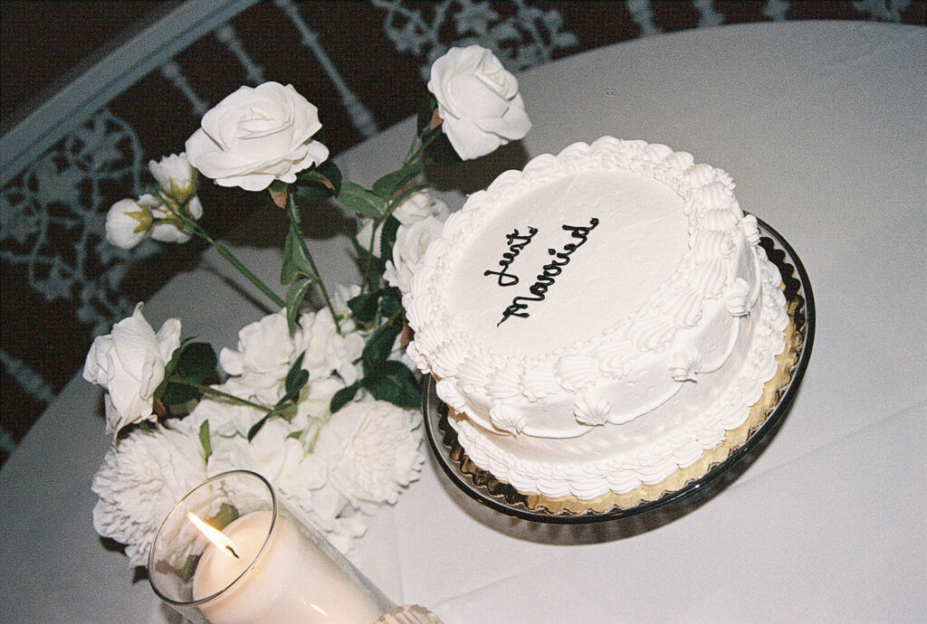 just married vintage style wedding cake detail photo at luxury wedding day