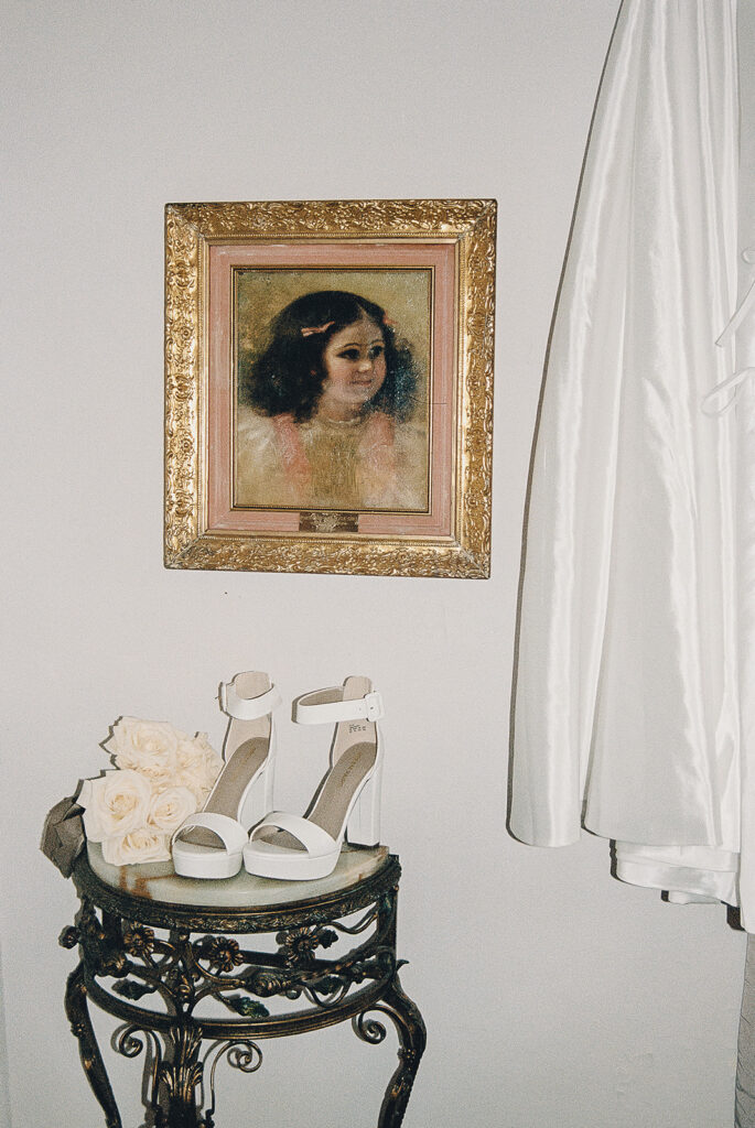 detail photo os the brides dress and shoes for her luxury wedding day