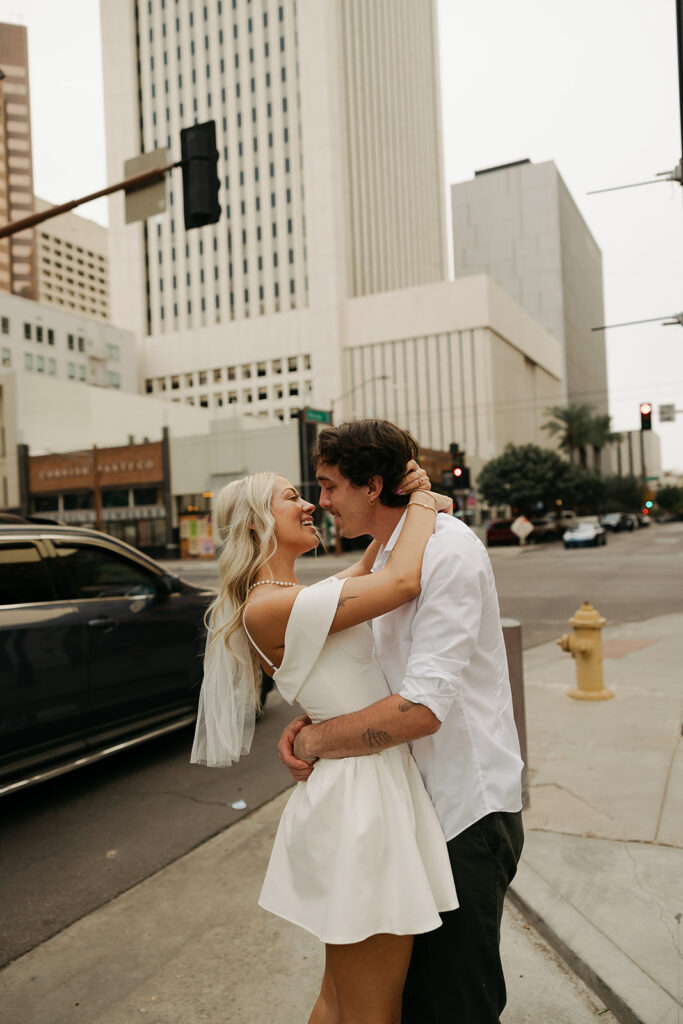 couple kissing and holding each other during couples session