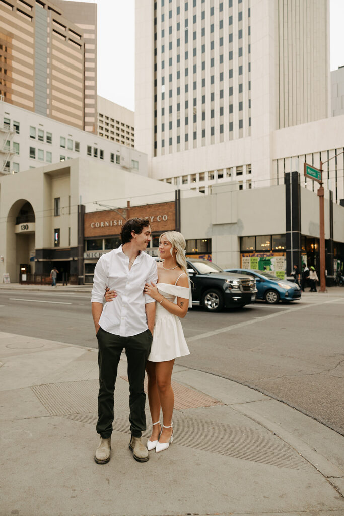 couple walking downtown during couples session