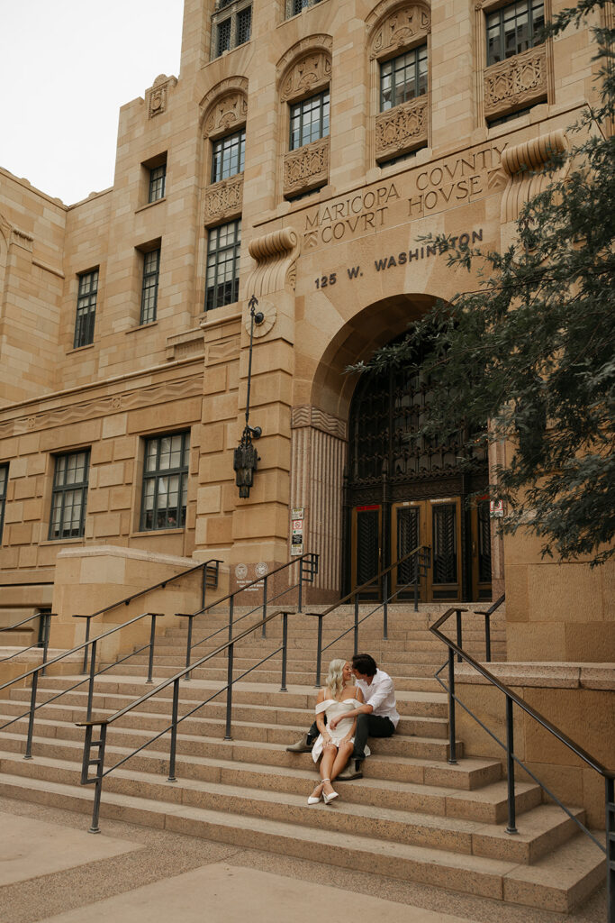 couple sitting on steps during couples session