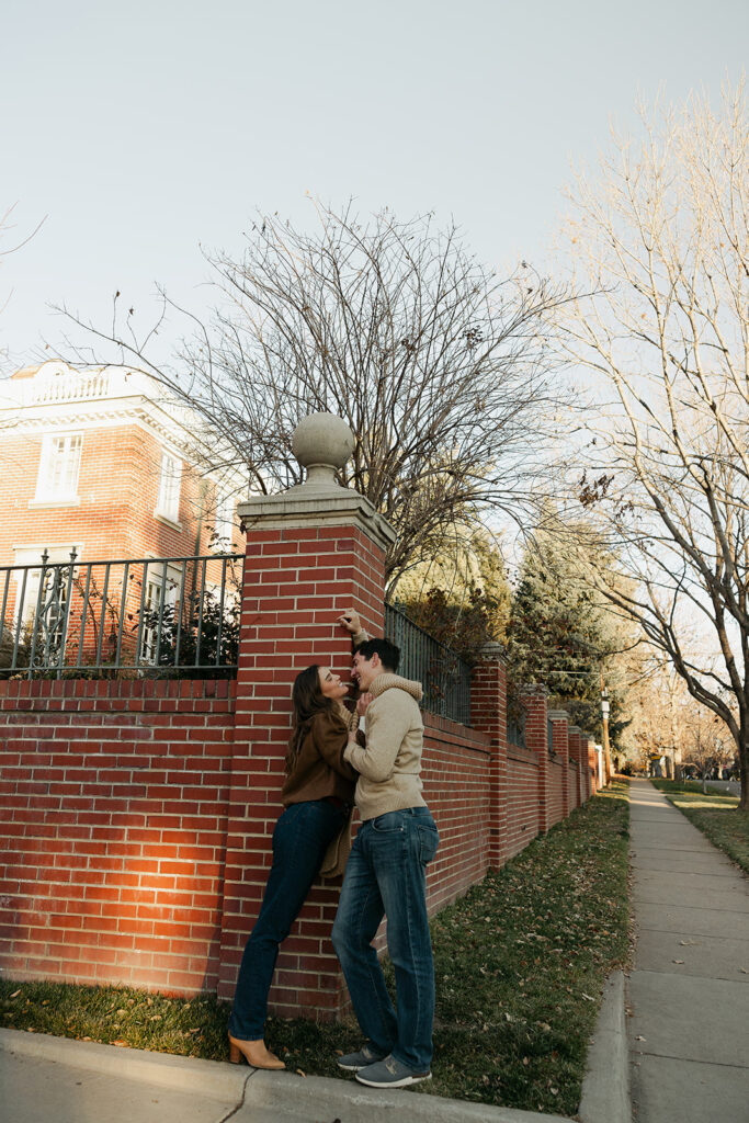 couple holding onto each other during colorado engagement photos