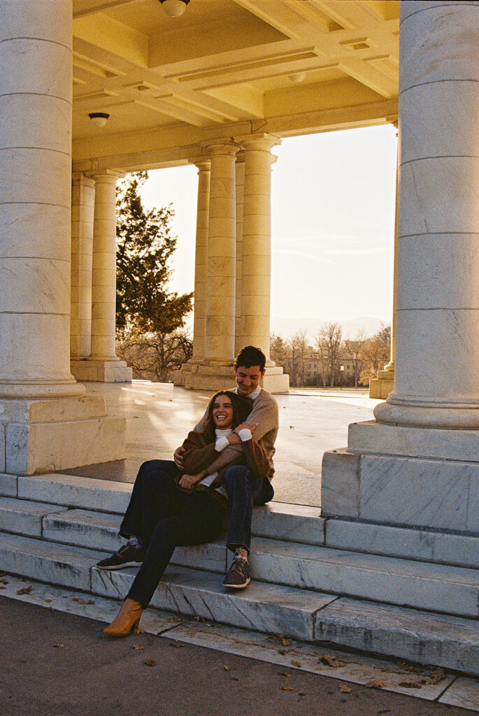 film photo of couple sitting together during couples session