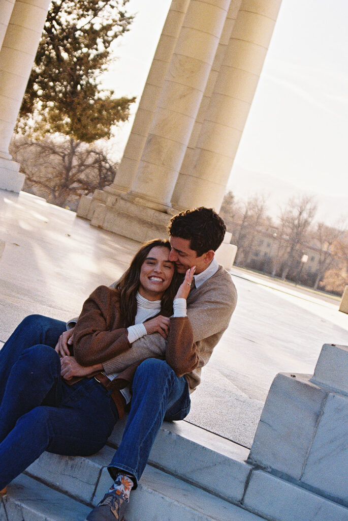 film photo of couple sitting together during couples session