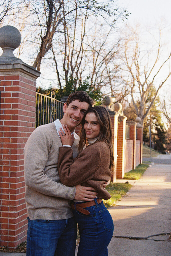 film photo of couple posing with each other at park during couples session