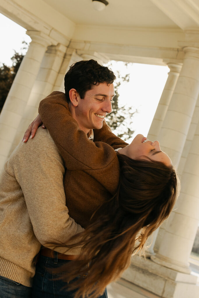 couple holding onto each other during colorado engagement photos