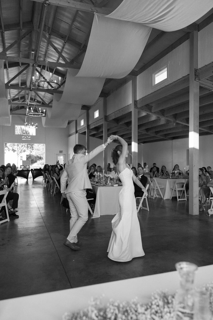 bride and groom dancing in their reception space at vista view events