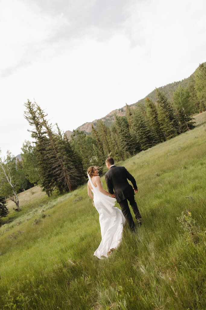 cute couple walking around their wedding venue