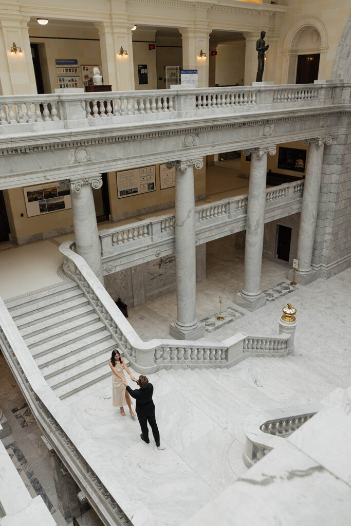 cute couple dancing during their engagement photoshoot