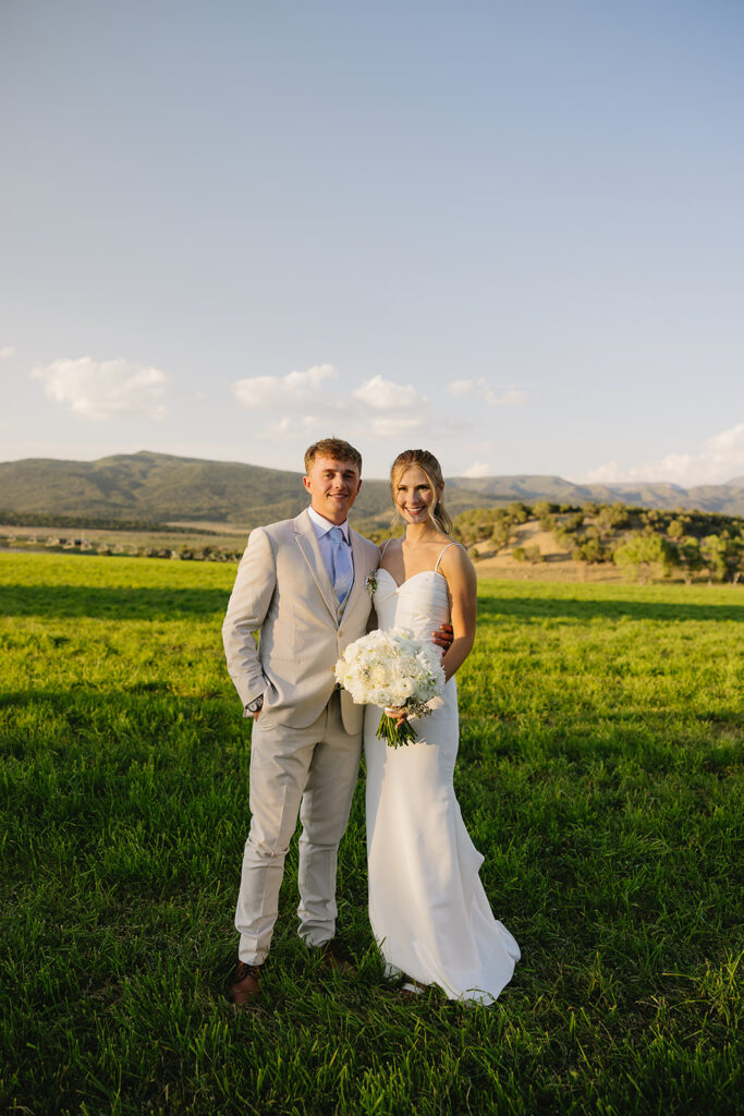 couple posing for the camera during their photoshoot