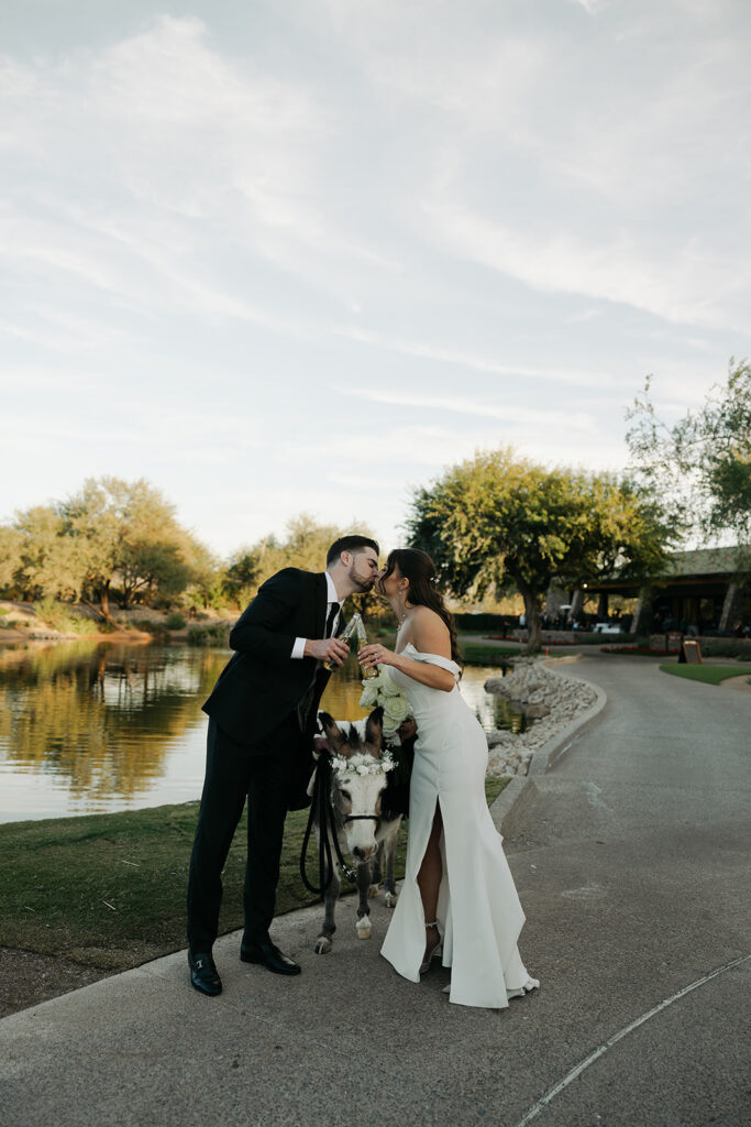 cute picture of the newlyweds celebrating with a beer