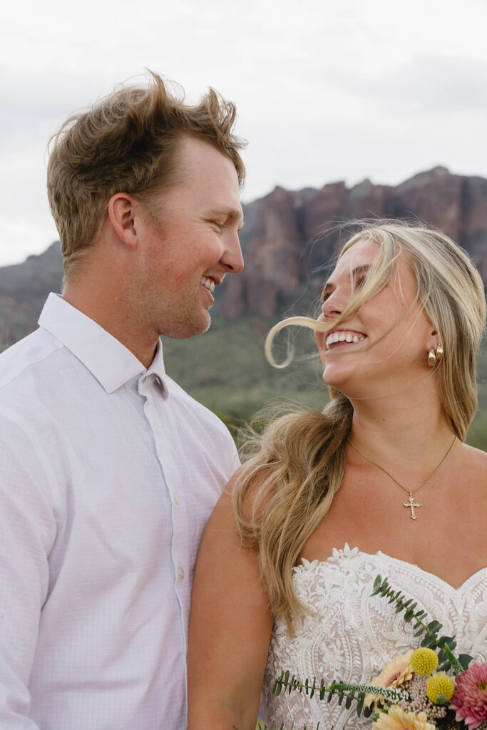 picture of the newlyweds looking and laughing with each other