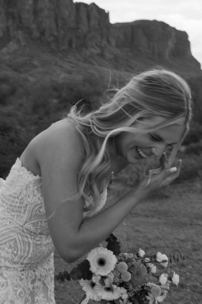 cute candid picture of the bride laughing during her bridal portraits 