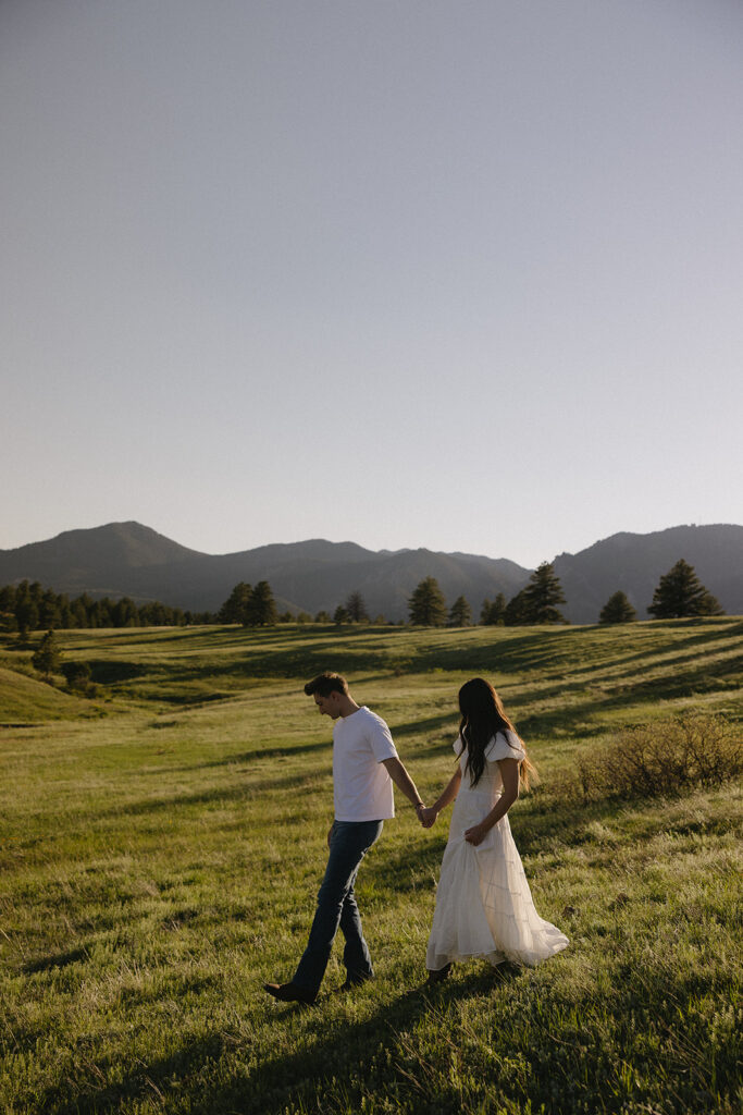 Heartfelt Summer Engagement Photos at Chautauqua Park with Madison and Tyler