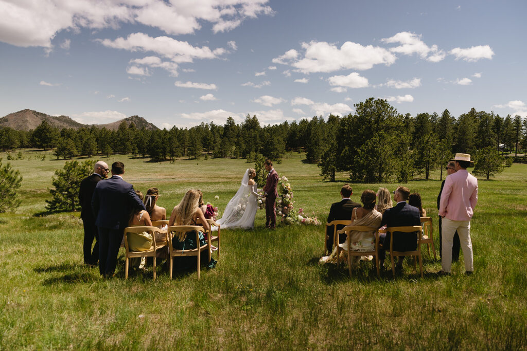 outdoor mountain ceremony in boulder at greystone castle boulder