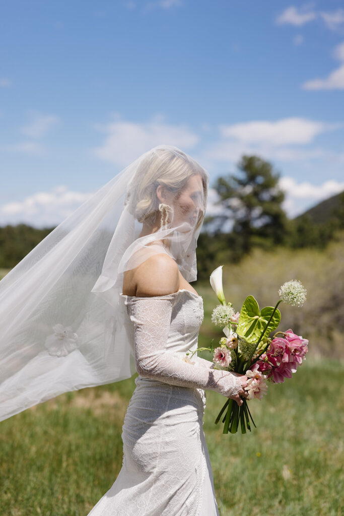film inspired outdoor ceremony photos against a mountain backdrop at greystone castle boulder