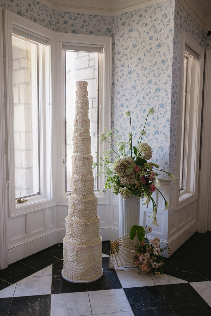 tall wedding cake and spring florals