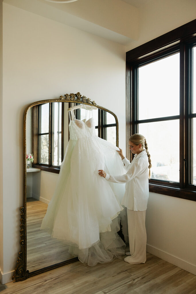 bride getting ready wedding dress photos