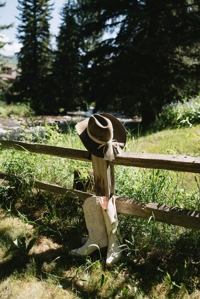 nostalgic wedding details cowgirl boots and hat