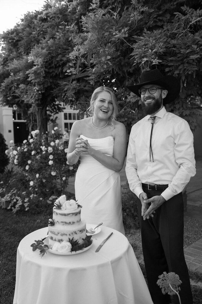 bride and groom eating their wedding cake