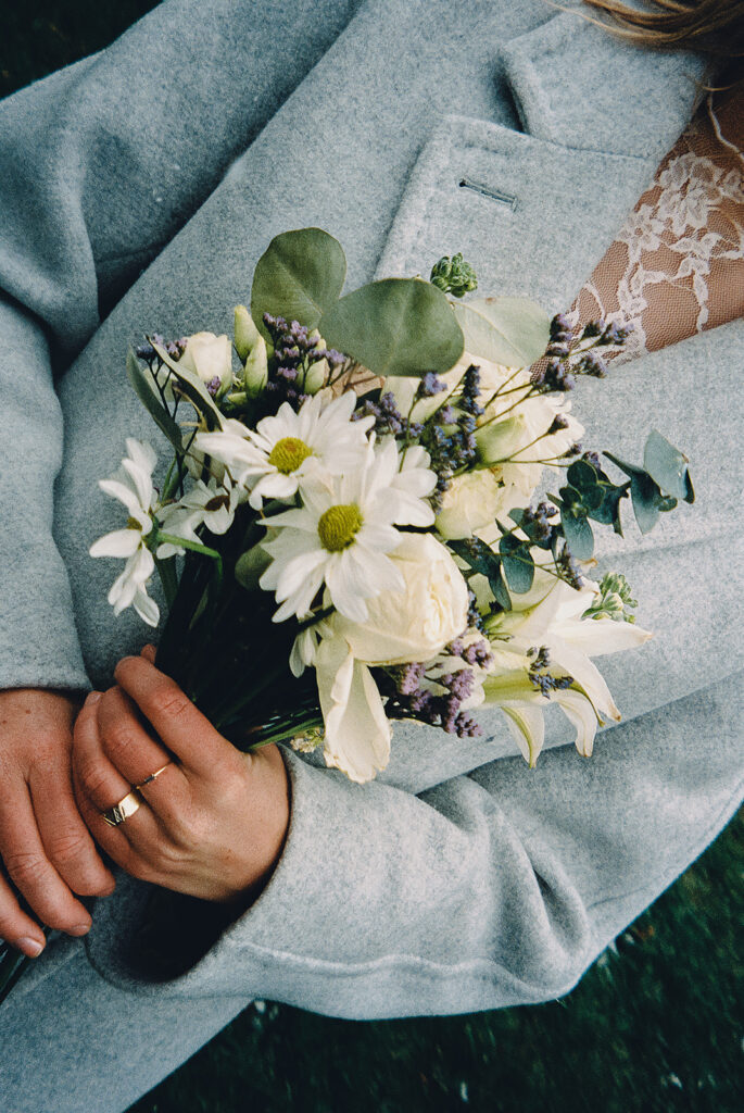vintage inspired wedding photos of bride holding bouquet