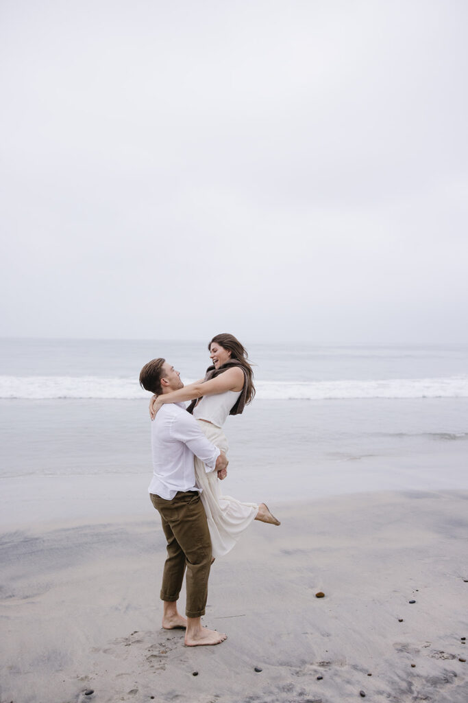 candid and cinematic couples photoshoot on a beach in san diego