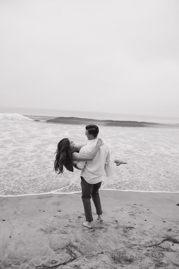 candid and cinematic couples photoshoot on a beach in san diego