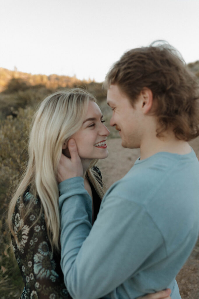 arizona mountain couples photoshoot outfits with a patterned dress engagement photo outfits guide