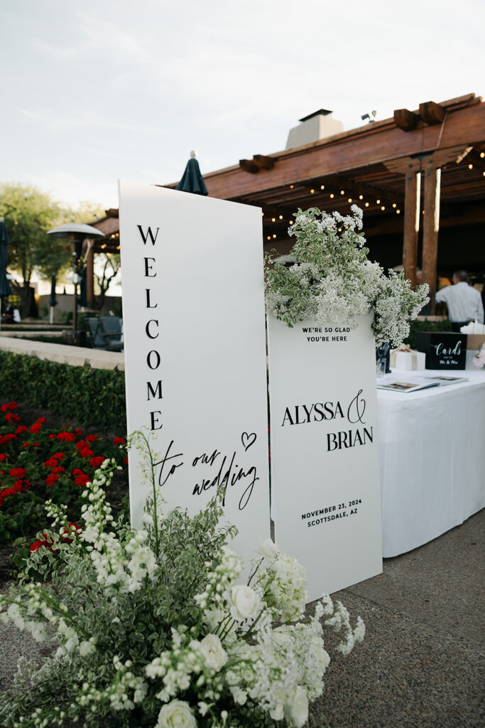 luxury wedding signage elegant with white florals