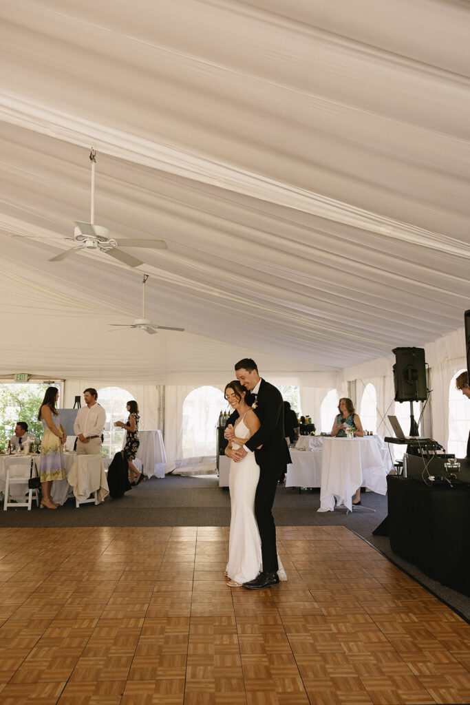 bride and groom first dance at reception