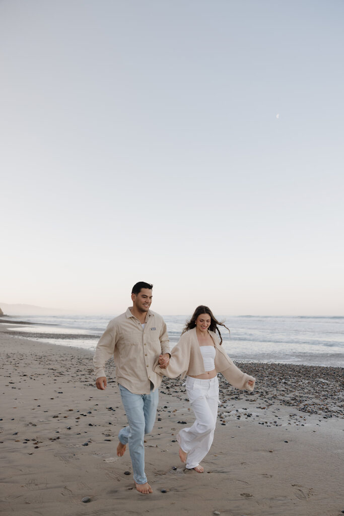 documentary style engagement photos beach engagement photos in san diego