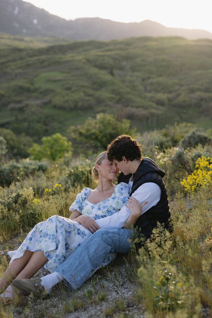 outdoor couples photos in the mountains with wildflowers