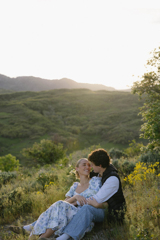 outdoor couples photos in the mountains with wildflowers