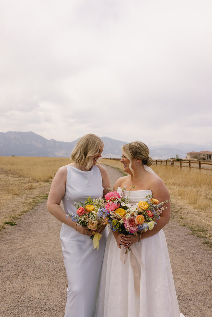outdoor wedding bridal party photos at a colorado wedding venue in front of the mountains