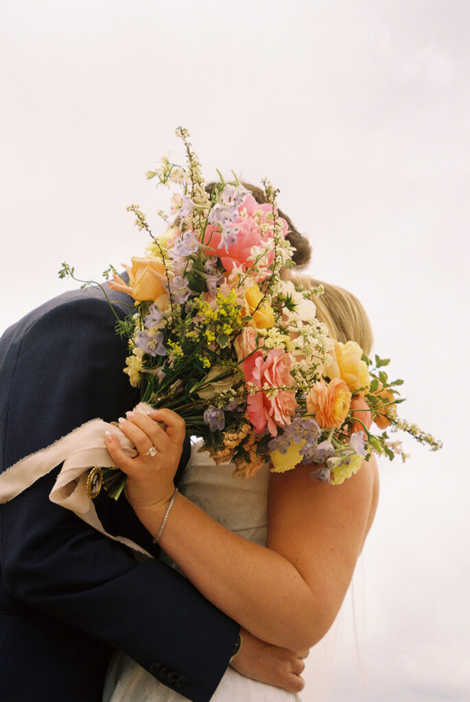 spring wedding colors through the lens of documentary style photography for a spring wedding theme in a colorado wedding venue