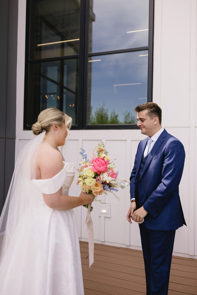 emotional first look with bride and groom