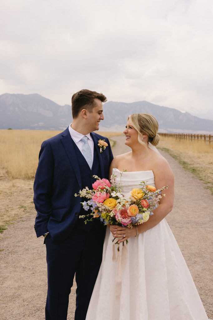 outdoor wedding bridal party photos at a colorado wedding venue in front of the mountains