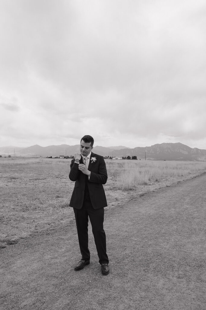 unique groomsmen poses candid groomsmen photos in the mountains for a spring wedding