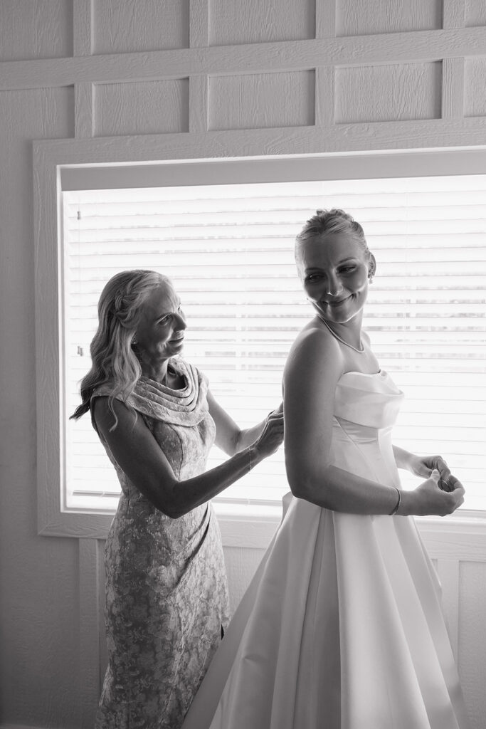 black and white documentary style wedding photography getting ready