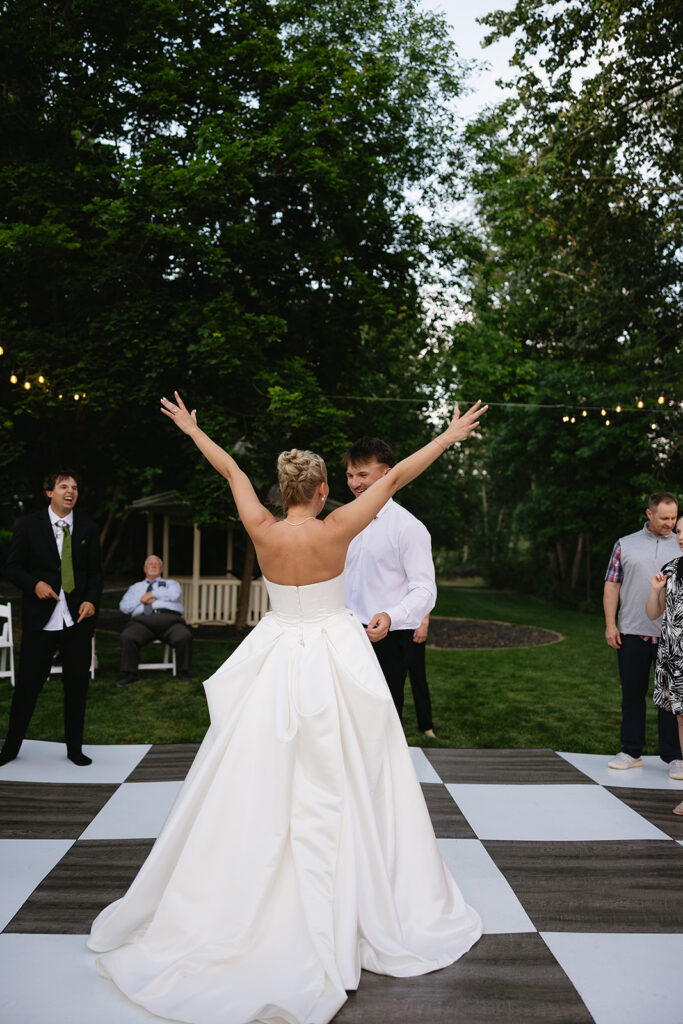 outdoor wedding ceremony on the boise river in idaho on a private family estate
