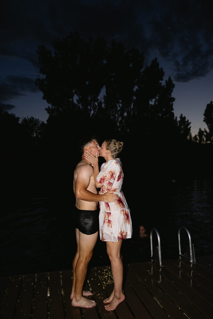 wedding party jumping into the boise river after outdoor wedding